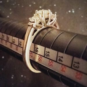 Authentic stamped Leo diamond . Past, present, and future 3/4 total ct. weight.